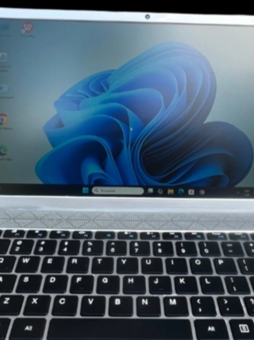 Intel Silver Laptop with Black Keyboard